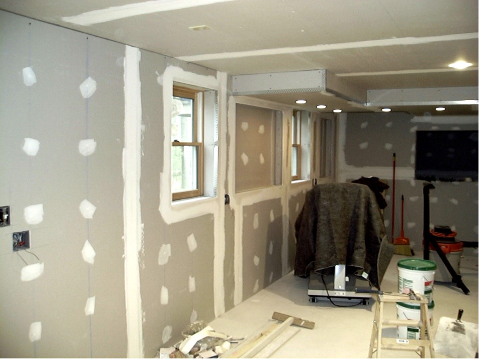 View showing that the sheetrock is complete and now compounding is beginning